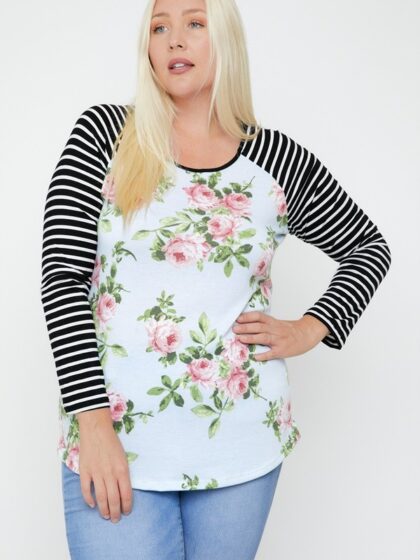 Floral Top Featuring Raglan Style Striped Sleeves And A Round Neck